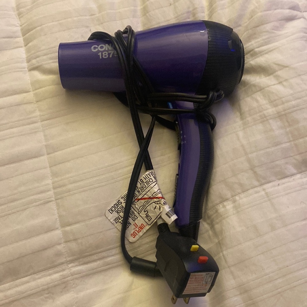 Black&purple con air 1875 hairdryer with settings.You can also get cool air !!
